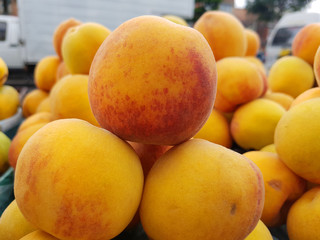 peaches in a local market of fruits in Bogota, Colombia