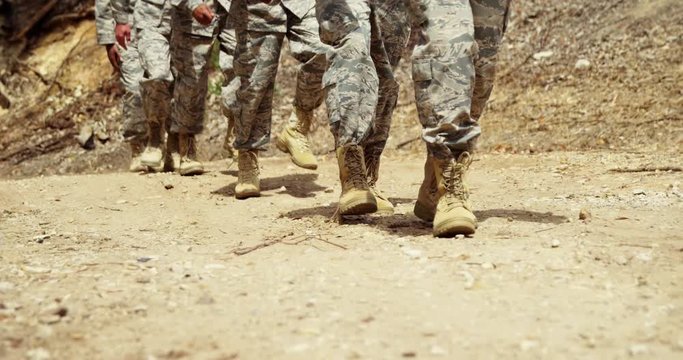Military troops walking at boot camp 