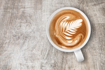 Coffee cup  on wooden desk