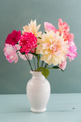 Crepe paper flower bouquet with peonies, dahlia and poppies in a vase