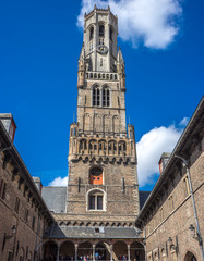 Fototapeta na wymiar The tall belfry tower at Brugge, Belgium, Europe