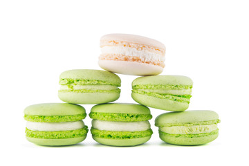 triangular pyramid of dessert macaron, on a light background