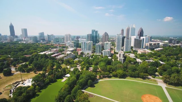 Atlanta Aerial v320 Flying low over Piedmont Park sunny full cityscape 9/17