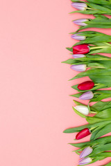 bouquet of tulips on a table with an empty seat