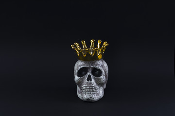 crown and skull on a black background