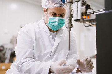 Healthcare creme production in laboratory. Creme products in lab. Healthcare industry.