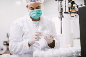 Healthcare creme production in laboratory. Creme products in lab. Healthcare industry.