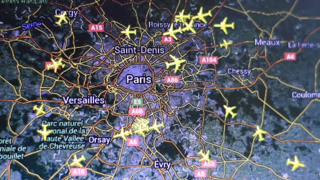 Map of airplanes in the vicinity of Paris city on computer screen