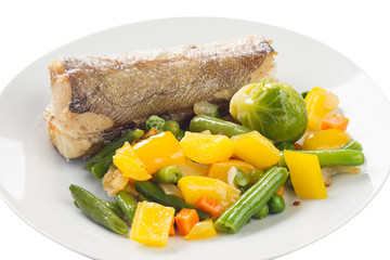 fried fish with vegetables on a plate, vegetables wok, white background