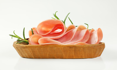 thin slices of ham with rosemary