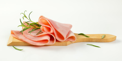 thin slices of ham and rosemary - obrazy, fototapety, plakaty
