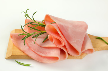 thin slices of ham and rosemary