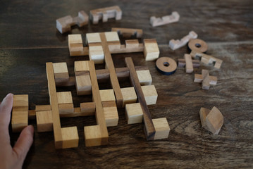 wood block puzzle game. education & leisure concept. growth, success & development in business