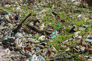 Heap of garbage in the river, giant environmental polution