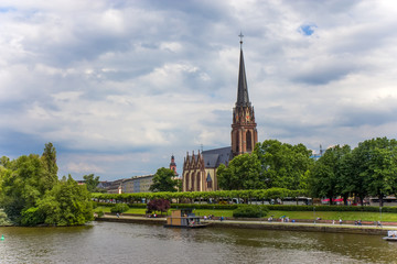 River Main. Embankment and church 