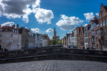 a great view of the famous Jan van Eyckplein from Koningstraat Bridge, Brugge, Belgium