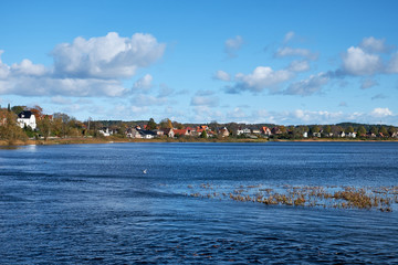 Looking down Gudenaaen and Lake Silkeborg with the houses lying close to by the shore