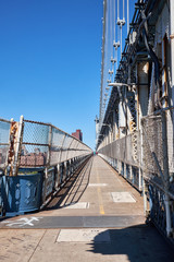 NEW YORK CITY - SEPTEMBER 25, 2016: The pedestrian lane surrounded by chicken wire, on Manhattan Bridge