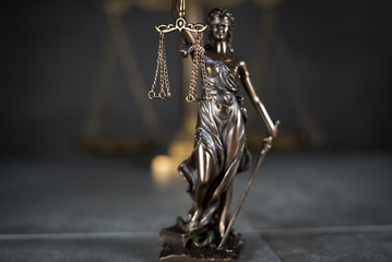 Law and Justice concept. Gray stone background, reflections on the floor, place for typography. Courtroom theme.