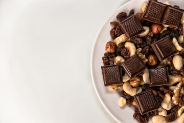 chocolate, milk chocolate with nuts, on a white background