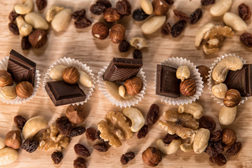 Fototapeta na wymiar chocolate, milk chocolate with nuts, on a white background