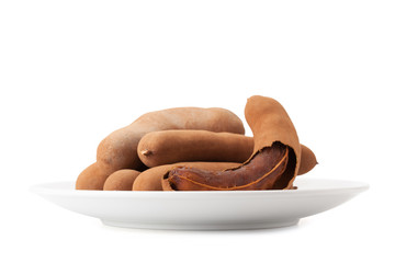 Top view tamarind pod isolated on white background with clipping path and soft shadow.