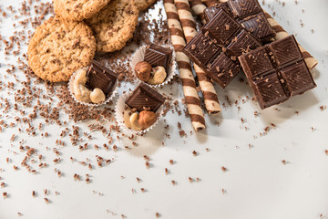 chocolate, milk chocolate with nuts, on a white background