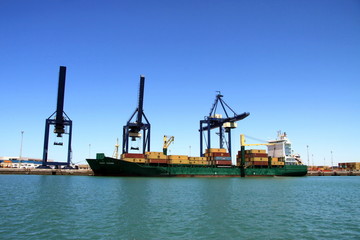 Fototapeta premium A container ship in the seaport of Cadiz.
