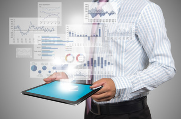 Reported profits on laptop.