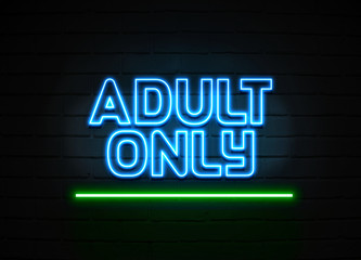 Adult Only neon sign mounted on brick wall.