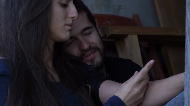 heroin addicted couple injecting drugs smiling