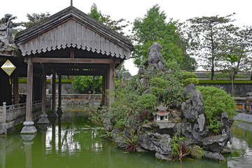Naklejka premium The Truong du Pavilion and lake within the Dien Tho Residence in the Imperial City, Hue, Vietnam
