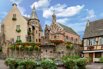 Fototapeta na wymiar Eguisheim. La place du village. Alsace, Haut Rhin. Grand Est
