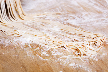 Fresh pasta  on kitchen table