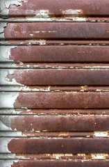Rusty and lowered rolling shutter with parallel lines