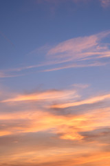 Fluffy clouds in the blue sky with morning light from the sunrise