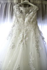 Fototapeta na wymiar Wedding dress hanging