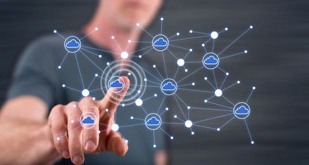 Man touching a cloud networking on a touch screen