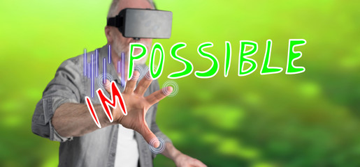 Man wearing a reality virtual headset touching a challenge concept on a touch screen