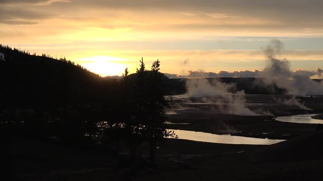 Sunset at  Midway Geyser Basin in Yellowstone NP. Timelapse. Wyoming, USA