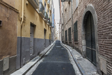 Narrow street in historic center of Perpignan.France.