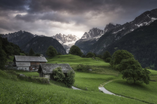 Clouds at dawn, Soglio, Bregaglia Valley, Maloja Region, Canton of Graubunden (Grisons)