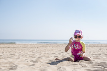 Little girl posing beach