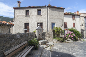 Village view, small and picturesque french village,member of Les Plus Beaux Villages de France (The most beautiful villages of France).Mosset,Pyrenees-Orientales,Occitanie.France.