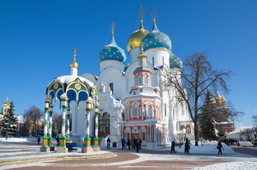 Fototapeta na wymiar Sergiev Posad, Moscow region, Russia - February 27, 2018: The Holy Trinity- Sergius Lavra. Cathedral of the Dormition and Assumption well of the chapel 