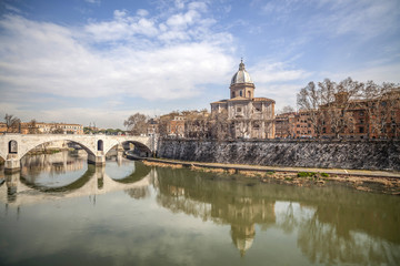 City view, Tiber river, dome of church S.Giovanni dei Fiorentini, ancient bridge, Ponte principe Amadeo Savoia Aosta, Rome.
