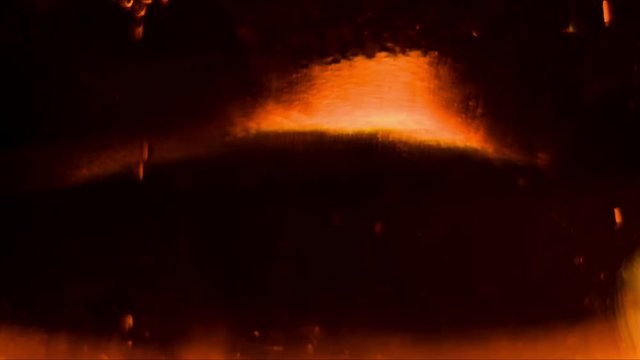 air bubbles in the liquid rise upwards