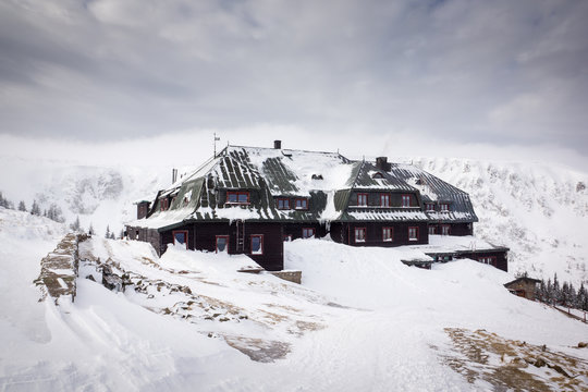 Mountain shelter Strzecha Akademicka in Karkonosze at winter, Sudety, Poland
