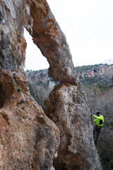 the rock-climber on a route with the lower insurance
