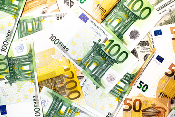 Euro banknotes close up. Several hundred 